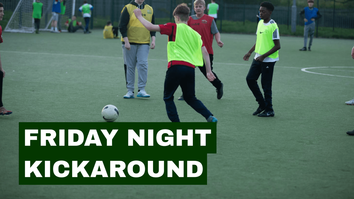 Young people playing football at Step Out Stay Out’s Friday Night Kickabout in Clifton.